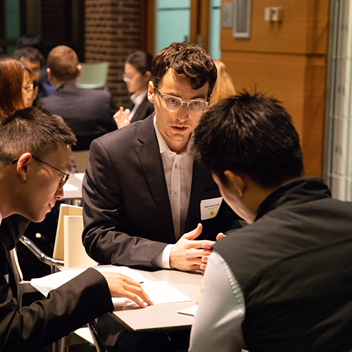 Alum coaching current students in mock interviews