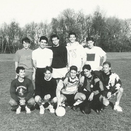 Students on the soccer team posing together