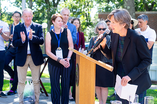 Dean Katy Graddy speaking in front of Rose Art Museum