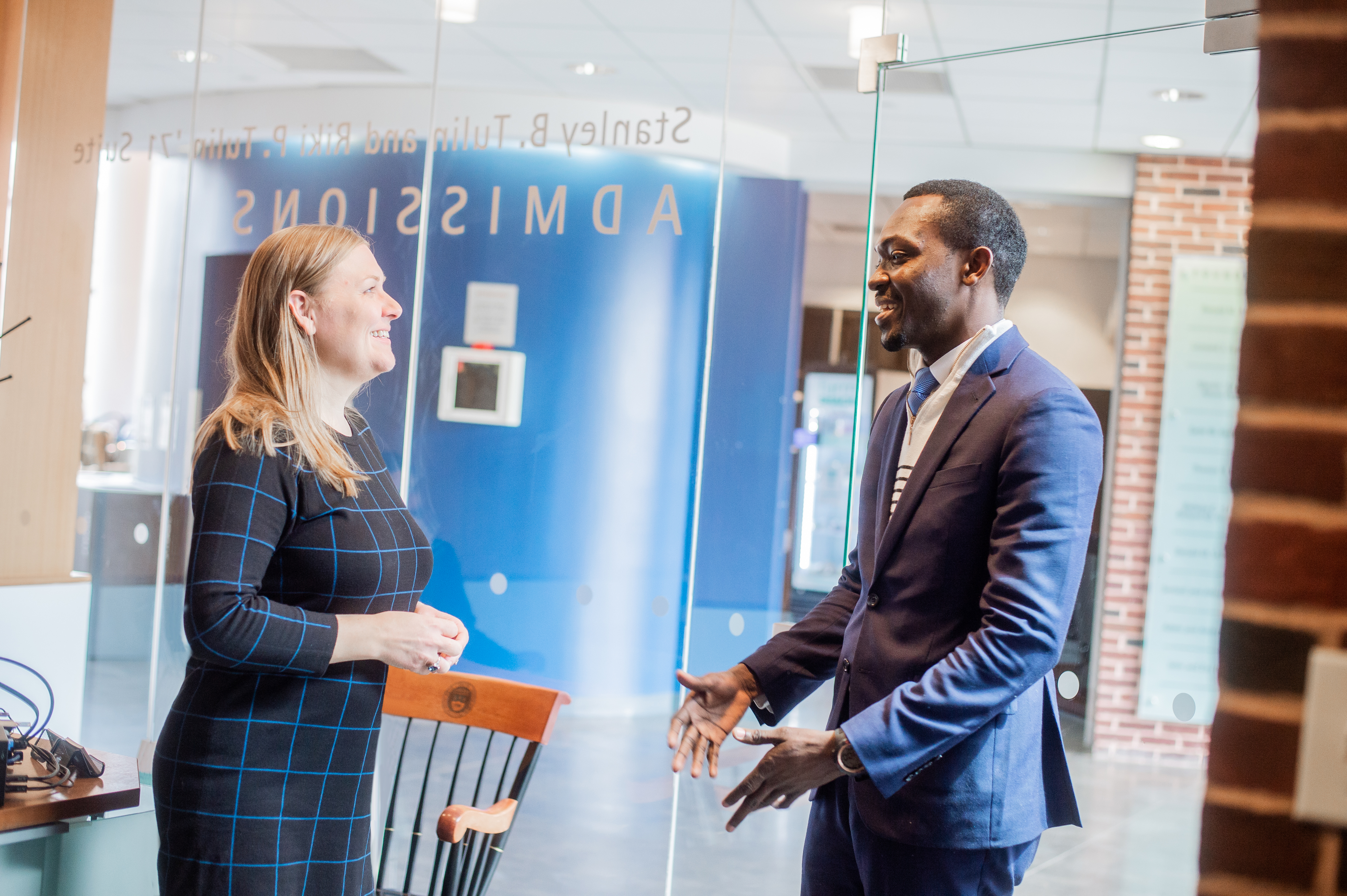 Student speaking with Dean of Admissions