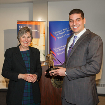 Ohad Elhelo receiving the award from Kathryn Graddy