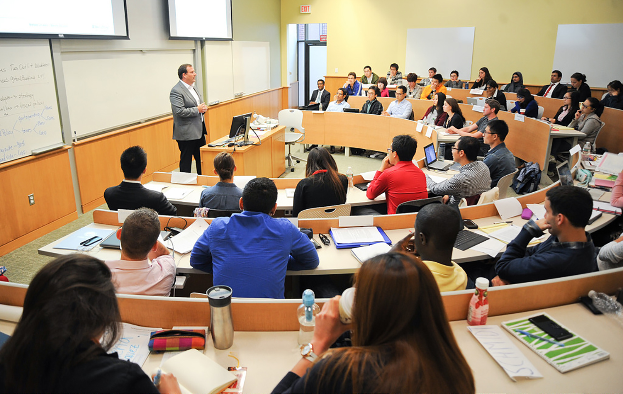 Business leader speaking to class