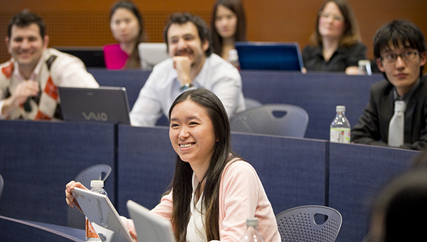 students smiling in class