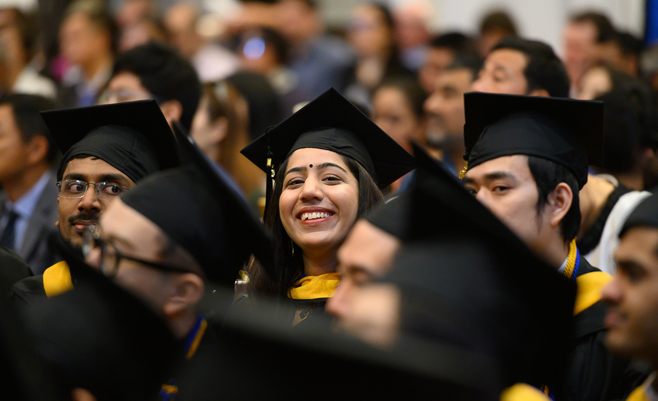 Students clapping at the 2019 commencement ceremony