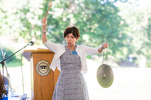 Kate Goldfield ringing the gong