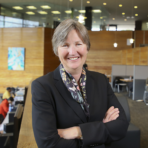 Dean Kathryn Graddy standing in the student study area.