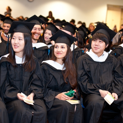 Students listen to a speech during the commencement ceremony.