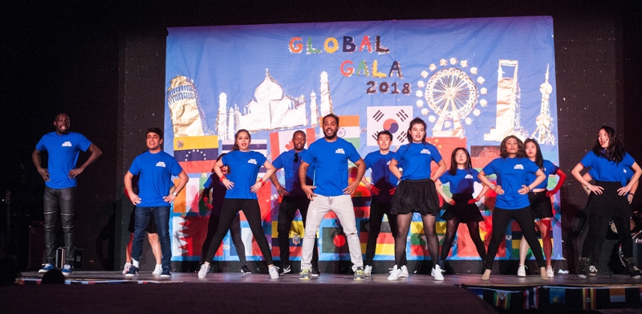 Group of students performing a dance number.