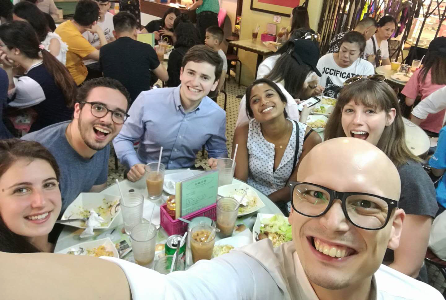 The fellows eating in a restaurant.