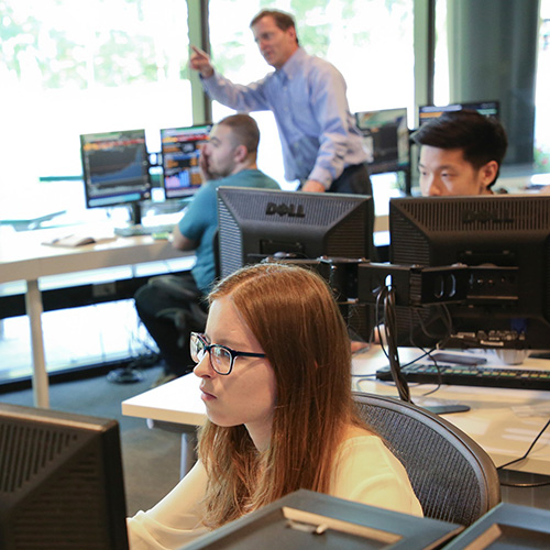Students get hands-on learning in the Bloomberg Lab at Brandeis IBS.