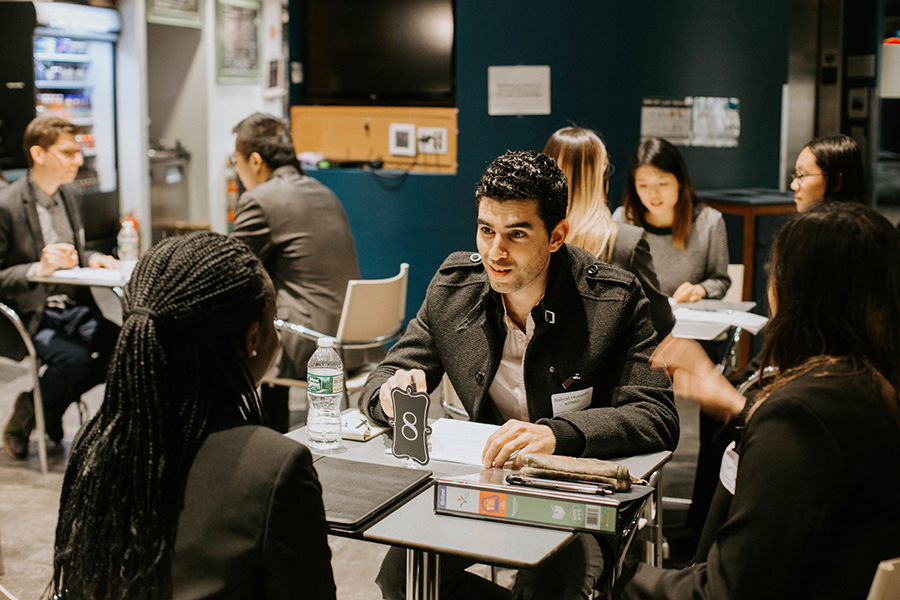 Alum interviews a student.