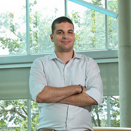 Alumni Ohad Elhel poses at the Mandel Center for Humanities at Brandeis.