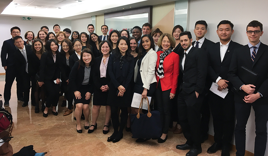 Fellows pose in the InvestHK headquarters.