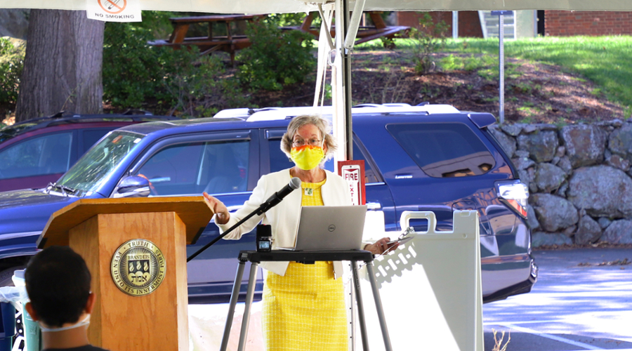 Catherine Mann gives an outdoor lecture.