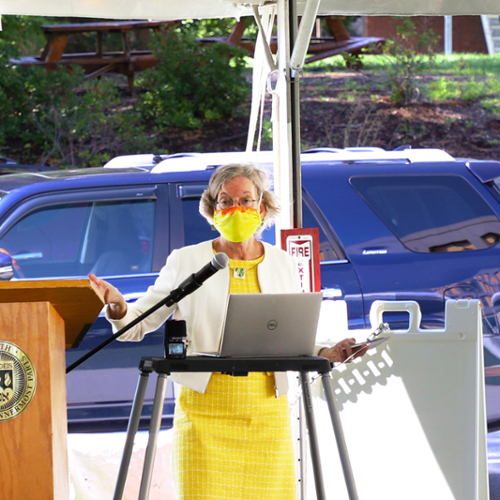 Economist Catherine Mann gave an outdoor lecture.