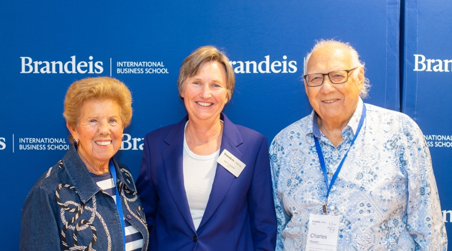 Charles B. Housen, right, with wife Marjorie (Grodner) ’56, left, and Dean Kathryn Graddy at Reunion Weekend in September 2019.