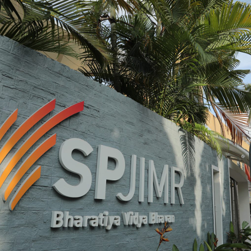 A photo of a sign outside the SPJIMR school in Mumbai.