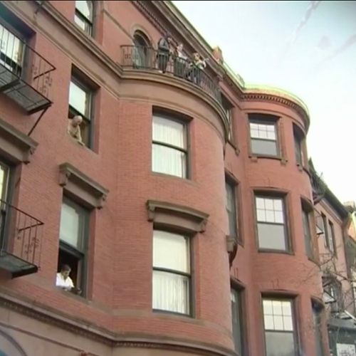 People signing from Back Bay brownstones.