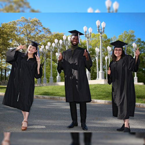 A photo of three graduates in their robes on campus.