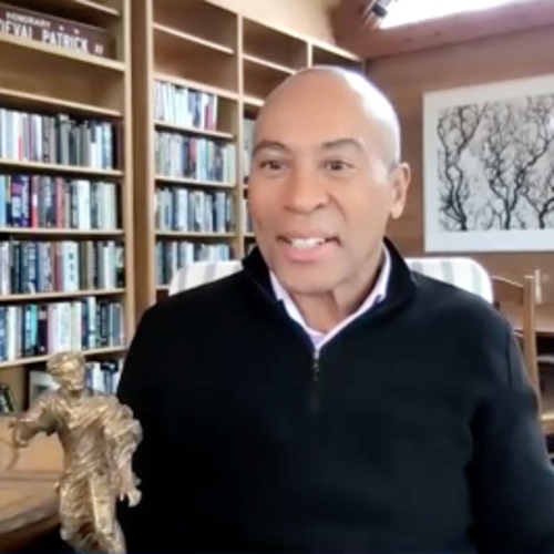 A screen shot of Deval Patrick accepting the Asper Award in his study.