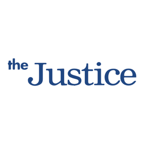 The logo for The Justice.