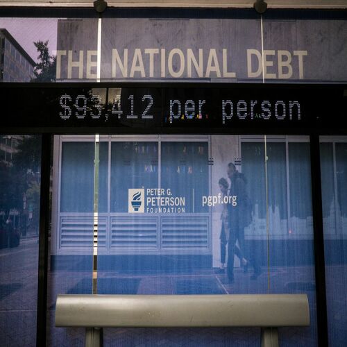 A clock showing the national debt in Washington, D.C., on Oct. 4, reading: $93,412 per person