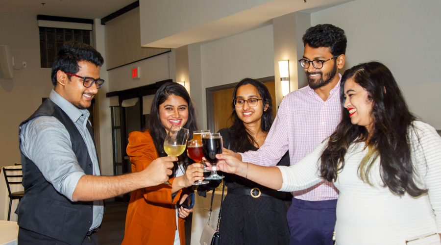 Students toast to their graduation.