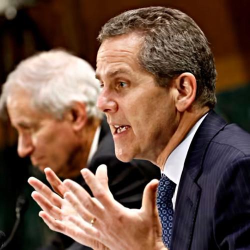 Michael Barr, vice chair for supervision at the US Federal Reserve, speaks and gestures with his hands during a Senate Banking, Housing, and Urban Affairs Committee hearing.