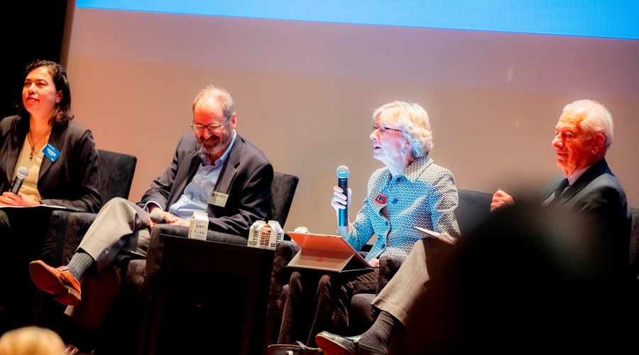 Anna Scherbina, George Hall, Catherine Mann and Peter Petri onstage for the panel discussion.