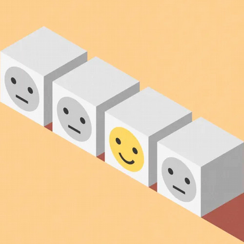 A row of four blocks, three of which are gray with frowning faces and one is yellow with a smiling face.