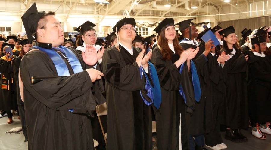 Brandeis International Business School students line up at Commencement.