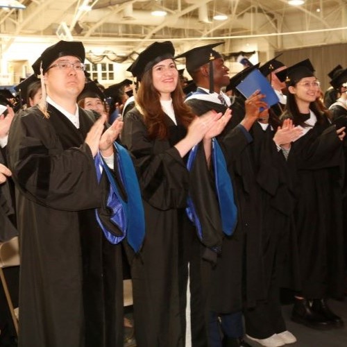 Brandeis International Business School students line up at Commencement.