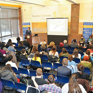 Attendees listen to the panelists.