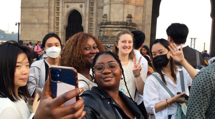 Students take a selfie in front of the Chhatrapati Shivaji Terminus train station in Mumbai.