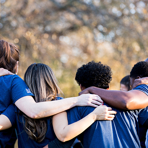 friends linking arms 