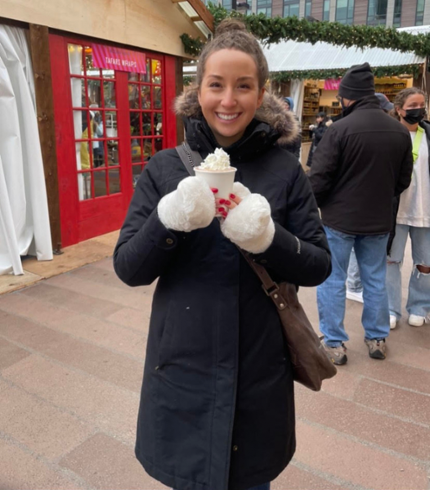 Picture of Abigail Kim standing outside in a winter coat.