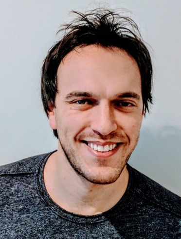 Headshot of Adam Sher