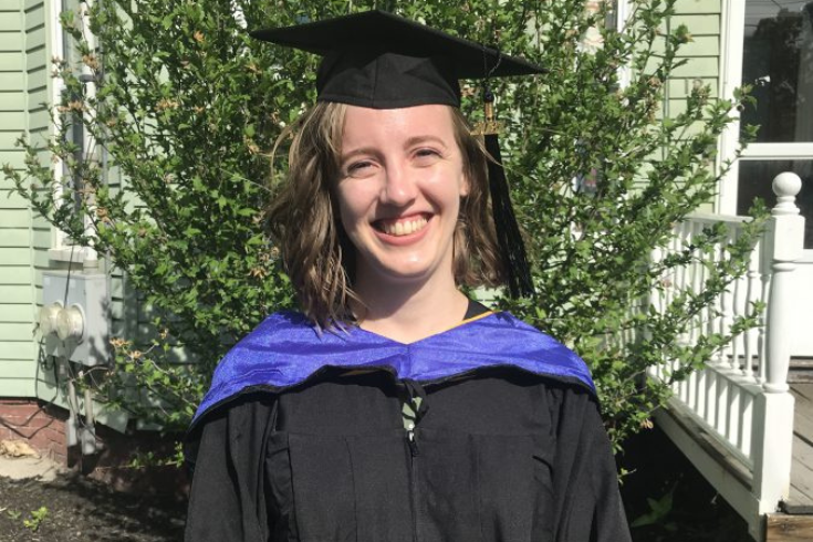 Picture of Annie Harrison in her cap and gown.