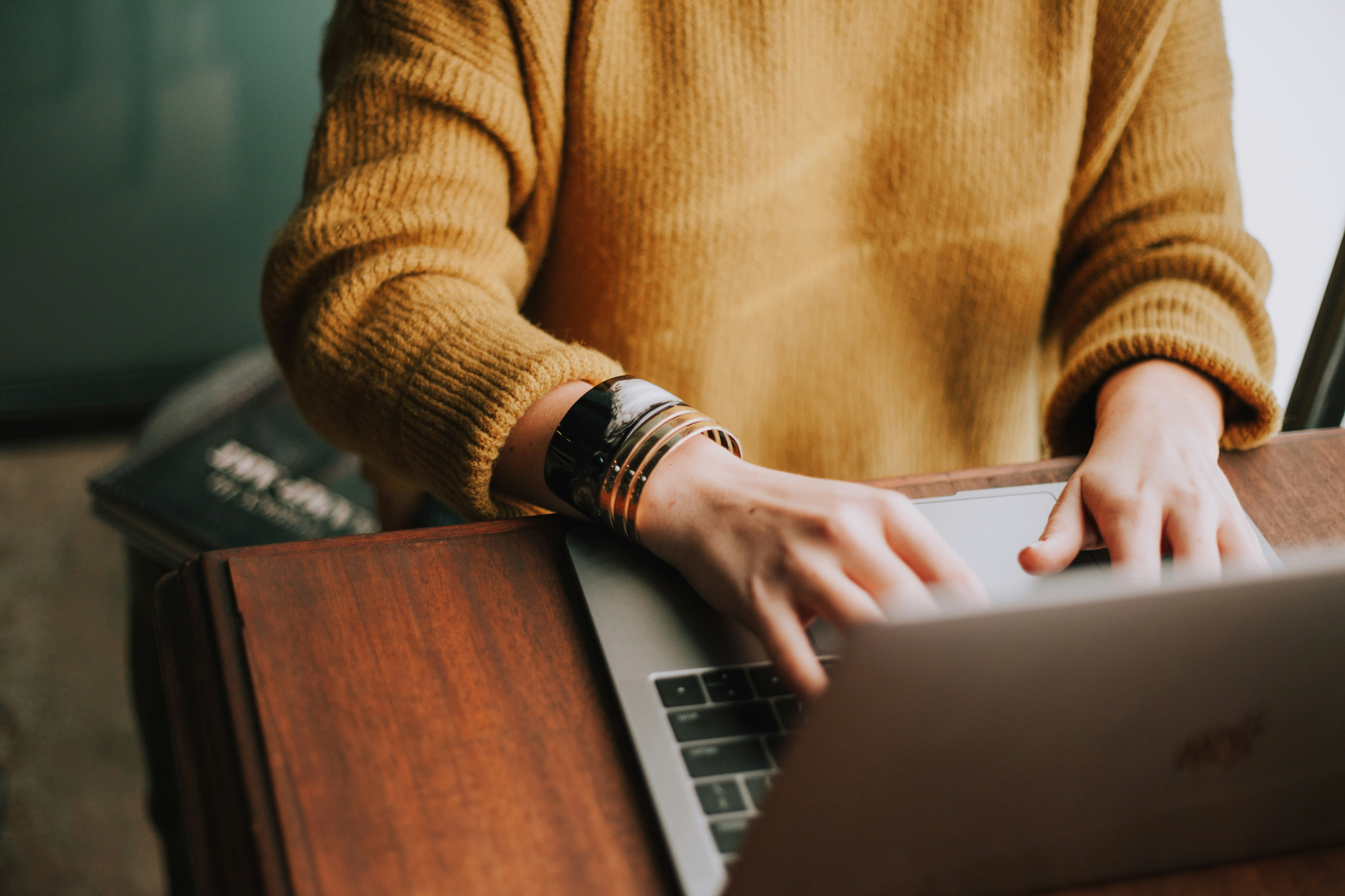 Woman does work at computer