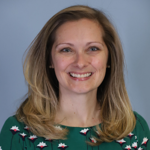 Christin Clohosey headshot - woman smiles at camera