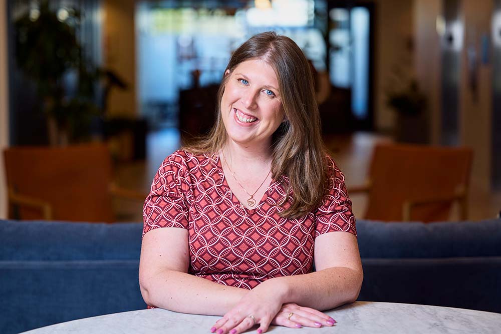 Heather Sternshein sits at a table.