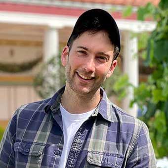 Stephen Anthony Guerriero standing in front of the Getty Villa
