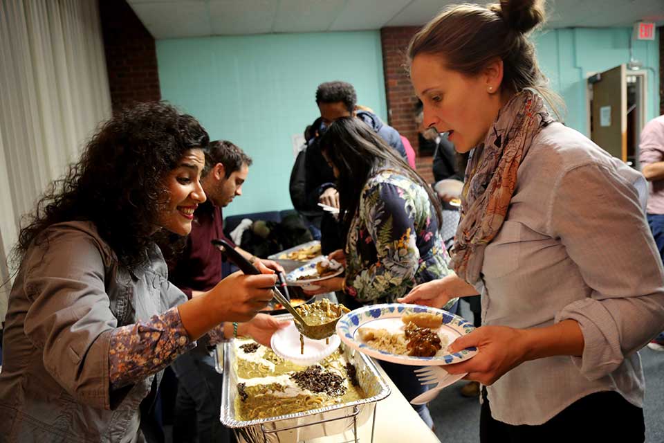 students are talking at club fair