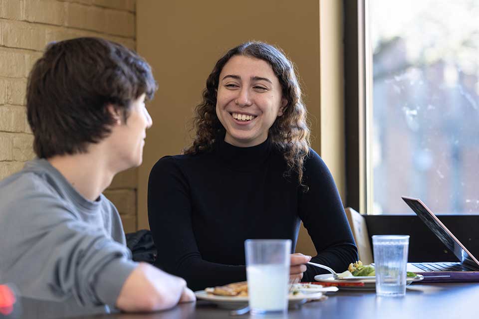 a person hold a bowl of food
