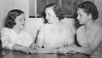 Adaire Klein with two students