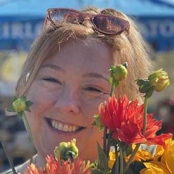 Marcie Brewer with flowers