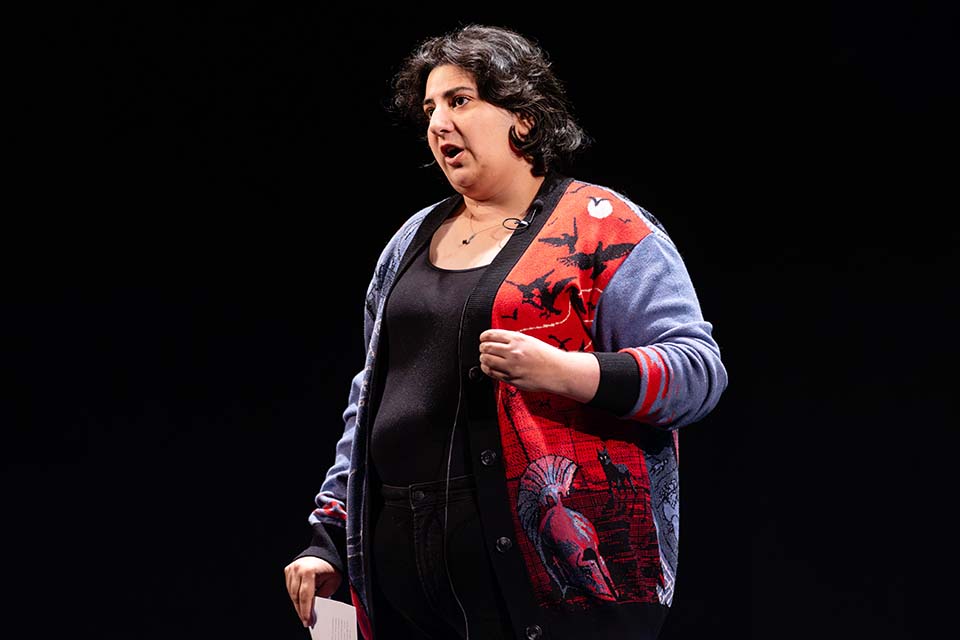 Alexandra Burkot stands presenting.