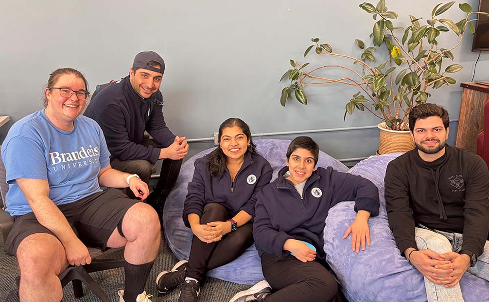 Antares Brown, Jaber Qadery, Bipasha Roy, Mehraveh Bastamkhani, and Anant Rose sit on beanbags.