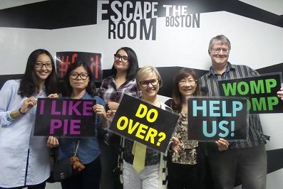 Group of students and faculty at Escape Room Boston