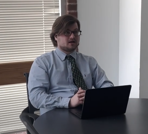 student sitting from video